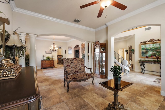 212 Crestrun Loop, Leesburg, FL 34748 - living area featuring ceiling fan, arched walkways, crown molding, baseboards, and stairway