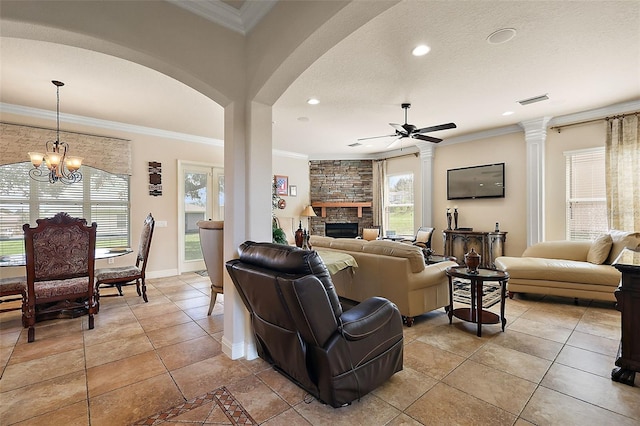212 Crestrun Loop, Leesburg, FL 34748 - living area featuring ceiling fan, a stone fireplace, recessed lighting, arched walkways, and ornamental molding