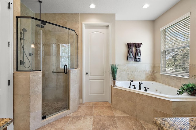 212 Crestrun Loop, Leesburg, FL 34748 - bathroom with a jetted tub, a stall shower, and recessed lighting