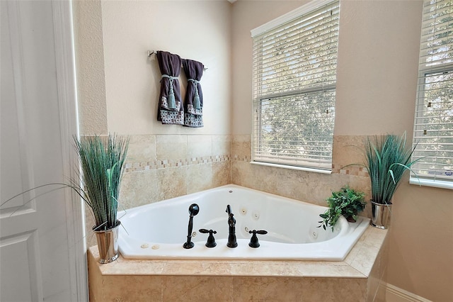212 Crestrun Loop, Leesburg, FL 34748 - bathroom featuring plenty of natural light and a whirlpool tub