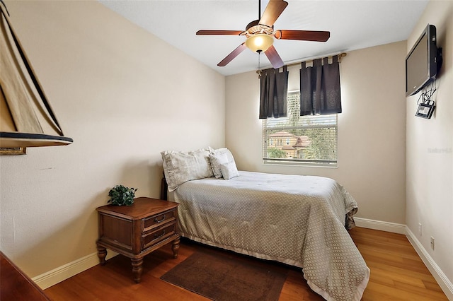 212 Crestrun Loop, Leesburg, FL 34748 - bedroom with light wood-style flooring, baseboards, and a ceiling fan
