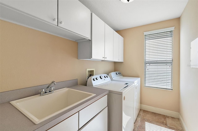 212 Crestrun Loop, Leesburg, FL 34748 - laundry room with separate washer and dryer, cabinet space, baseboards, and light tile patterned floors