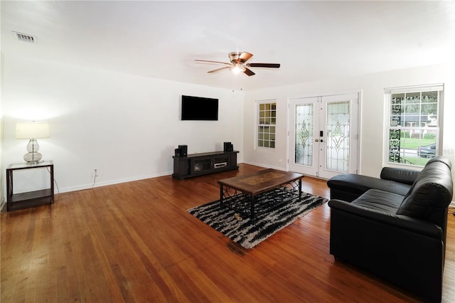 living room featuring french doors, hardwood / wood-style floors, and ceiling fan