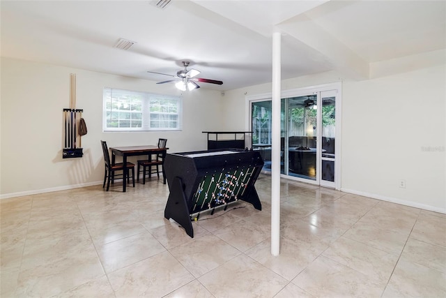 dining space featuring ceiling fan