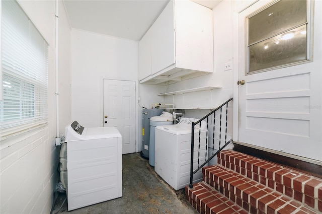 washroom featuring independent washer and dryer