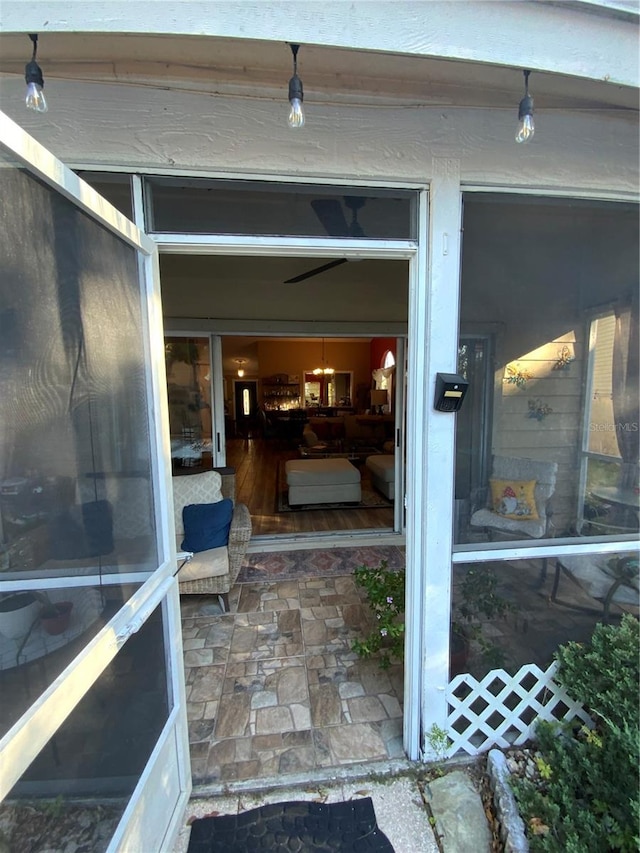 property entrance featuring a patio area