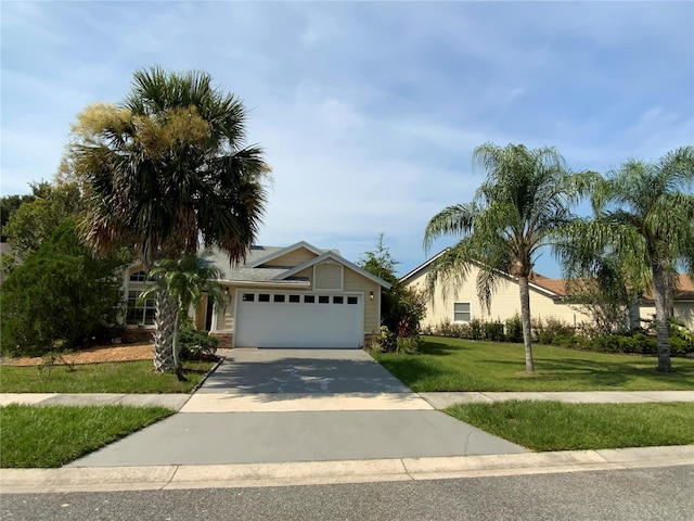 2939 Falling Tree Cir, Orlando, FL 32837 - view of front of property featuring a garage, driveway, and a front lawn