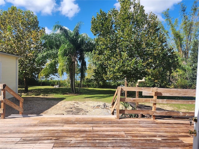 14902 Arrena Rd, Winter Garden, FL 34787 - wooden deck featuring a lawn