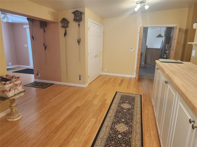 hallway featuring light hardwood / wood-style floors