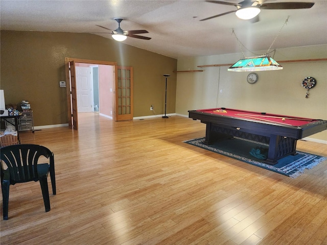 recreation room featuring ceiling fan, hardwood / wood-style flooring, vaulted ceiling, and billiards