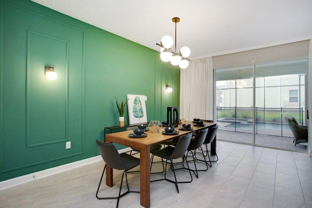 dining space with an inviting chandelier