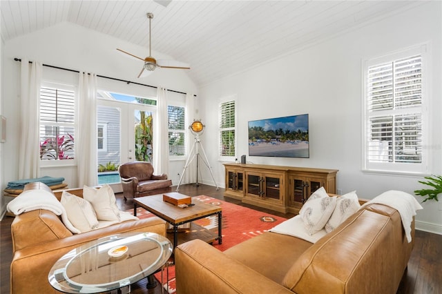 living room with lofted ceiling, a healthy amount of sunlight, ceiling fan, and dark hardwood / wood-style flooring