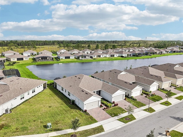 bird's eye view with a water view