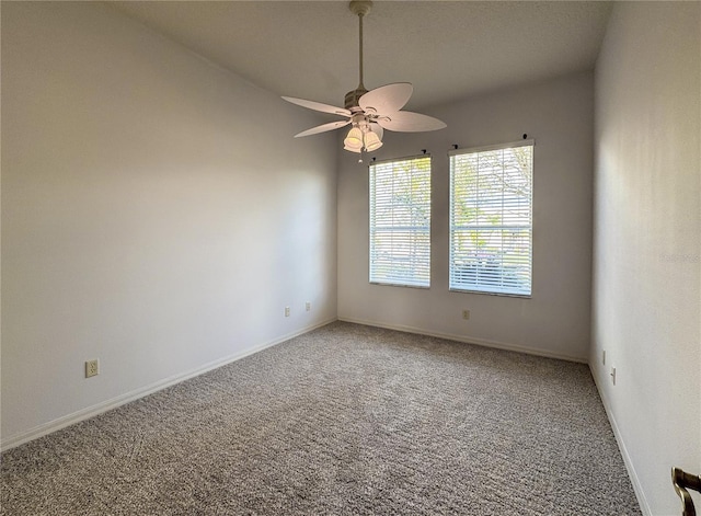 carpeted empty room with ceiling fan