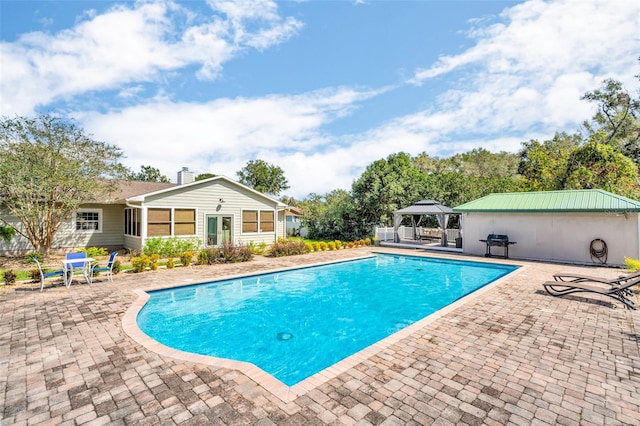 view of pool featuring a gazebo and a patio