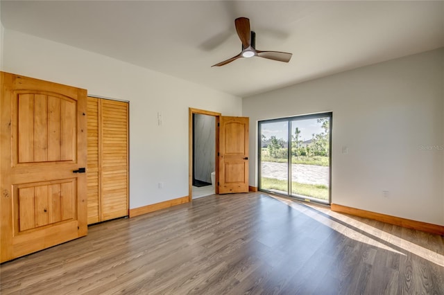 unfurnished bedroom with access to outside, ceiling fan, a closet, and light hardwood / wood-style floors