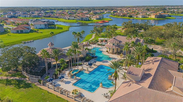 drone / aerial view featuring a water view