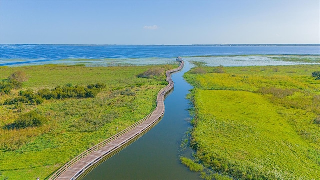 drone / aerial view featuring a water view