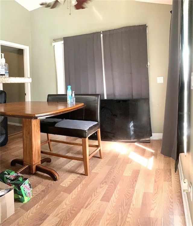 interior space with light wood-type flooring and ceiling fan