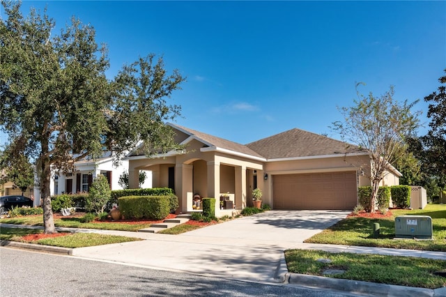 view of front of property with a garage