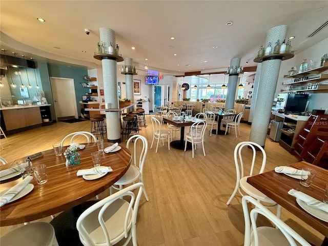 dining room featuring light hardwood / wood-style flooring