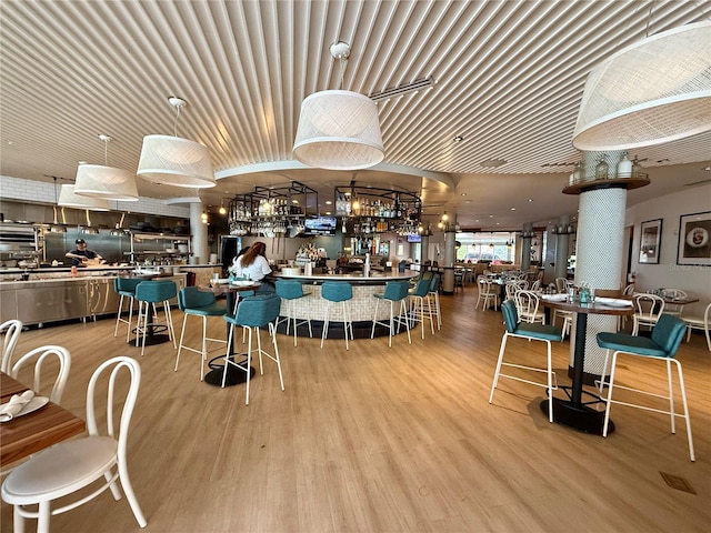 dining space featuring light hardwood / wood-style flooring