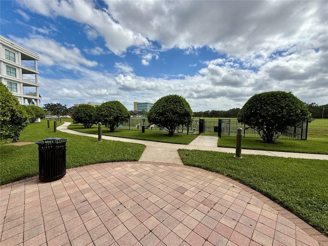 view of home's community featuring a yard