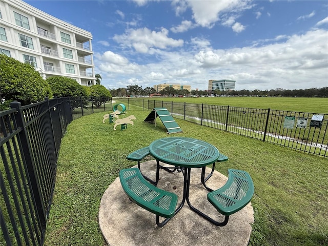 surrounding community featuring a lawn