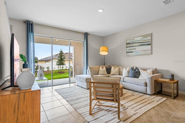 living room featuring light tile patterned flooring