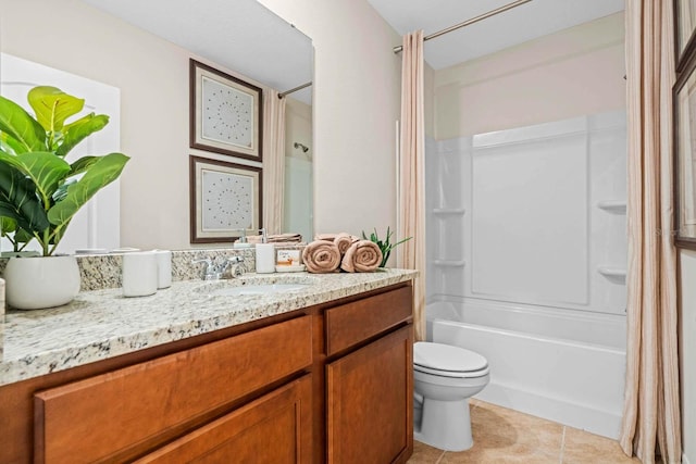 full bathroom featuring vanity, tile patterned flooring, toilet, and shower / tub combo