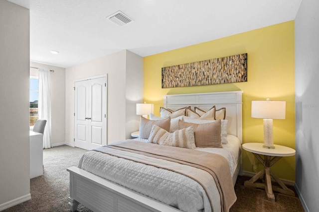 bedroom featuring a closet and carpet flooring