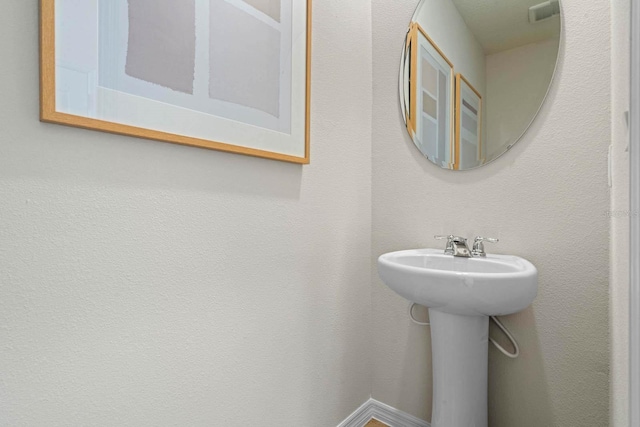 bathroom featuring sink