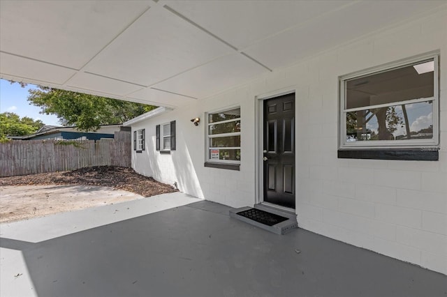 doorway to property with a patio area