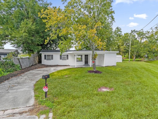 view of front of property with a front lawn