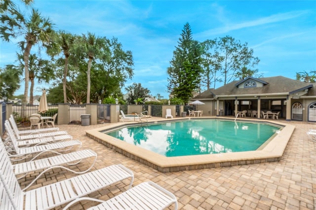 view of pool featuring a patio area