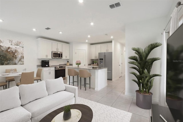 living room with light tile patterned floors