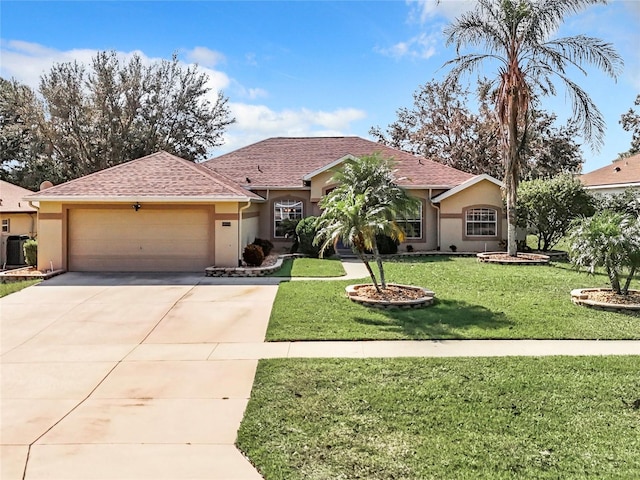 view of front facade with a front lawn and a garage