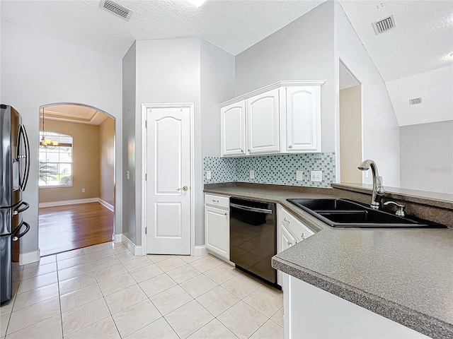 kitchen with white cabinetry, dishwasher, sink, and a textured ceiling