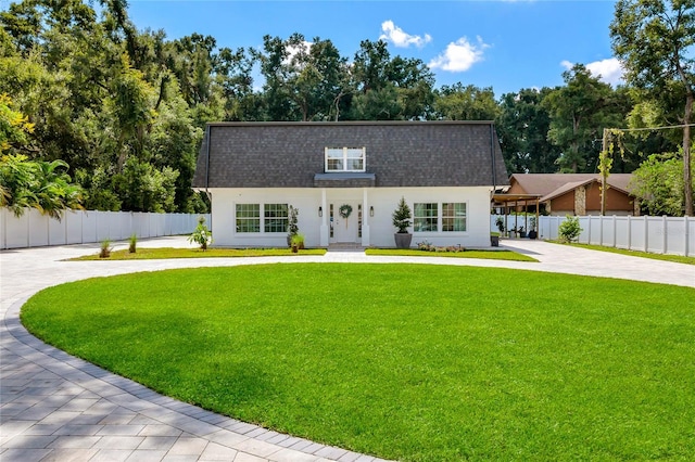 view of front of house with a front lawn