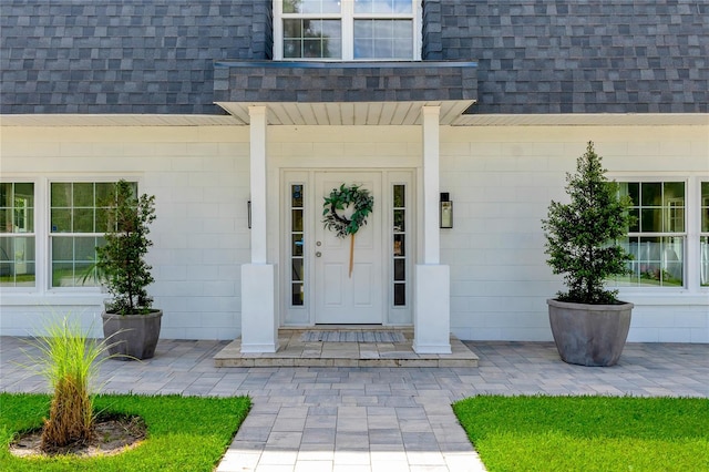 doorway to property featuring a porch