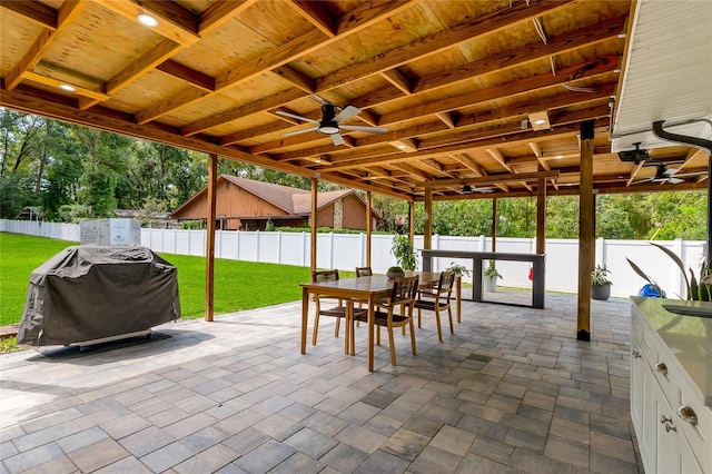 view of patio / terrace with area for grilling and ceiling fan