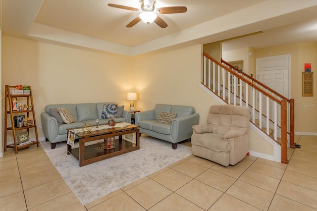 tiled living room featuring ceiling fan