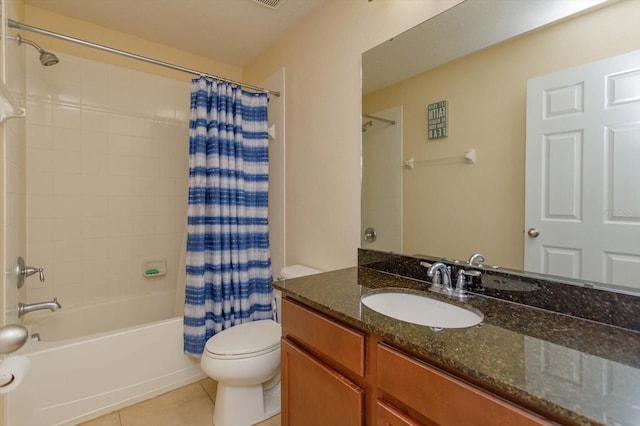 full bathroom featuring vanity, toilet, shower / bath combination with curtain, and tile patterned flooring