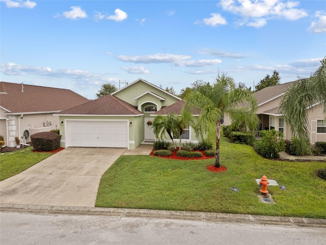 ranch-style house featuring a garage and a front lawn