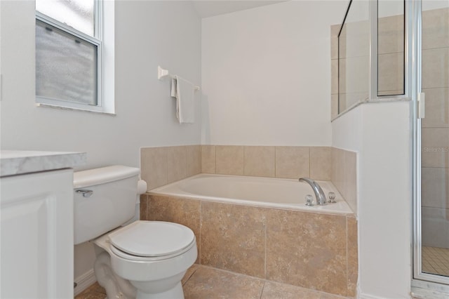 full bathroom featuring independent shower and bath, tile patterned floors, vanity, and toilet