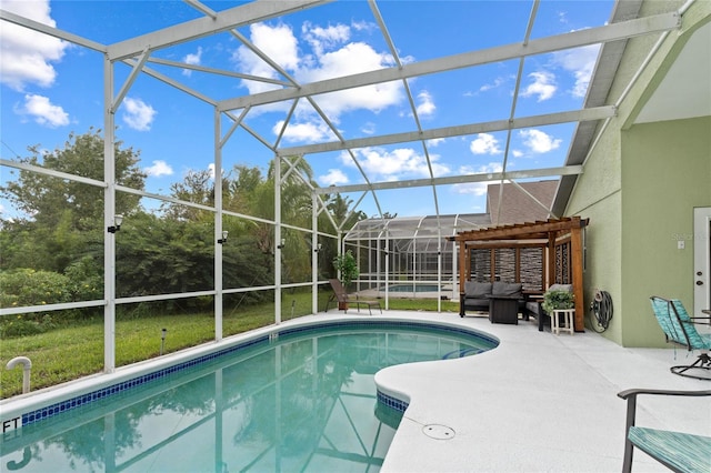 view of swimming pool featuring a lanai and a patio area