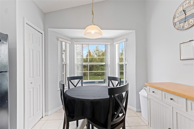 246 Kimberly Point Dr, Davenport, FL 33837 - dining space with light tile patterned flooring and baseboards