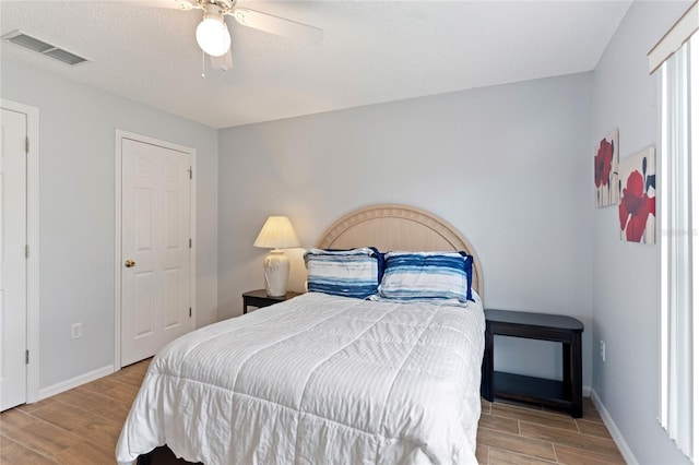 246 Kimberly Point Dr, Davenport, FL 33837 - bedroom featuring wood finish floors, baseboards, and ceiling fan