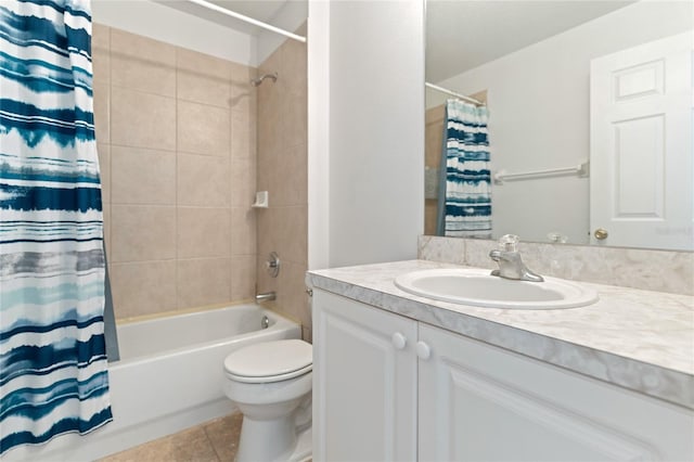 246 Kimberly Point Dr, Davenport, FL 33837 - bathroom with tile patterned flooring, shower / bath combo with shower curtain, toilet, and vanity