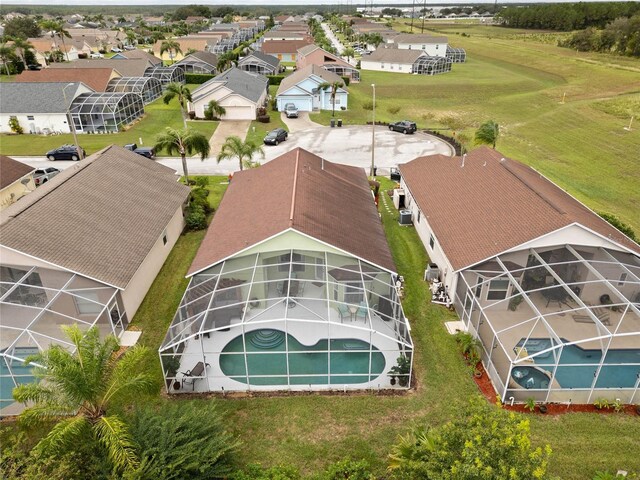 246 Kimberly Point Dr, Davenport, FL 33837 - aerial perspective of suburban area featuring a pool area